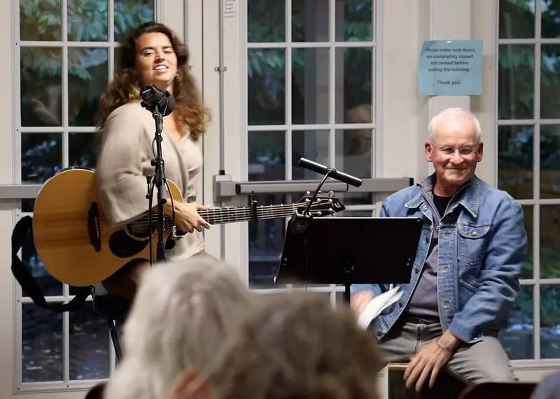 Two performers playing together at the Open Mic
