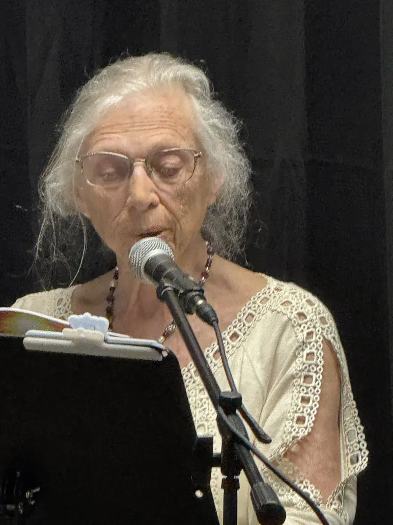 Poet reading at the Open Mic